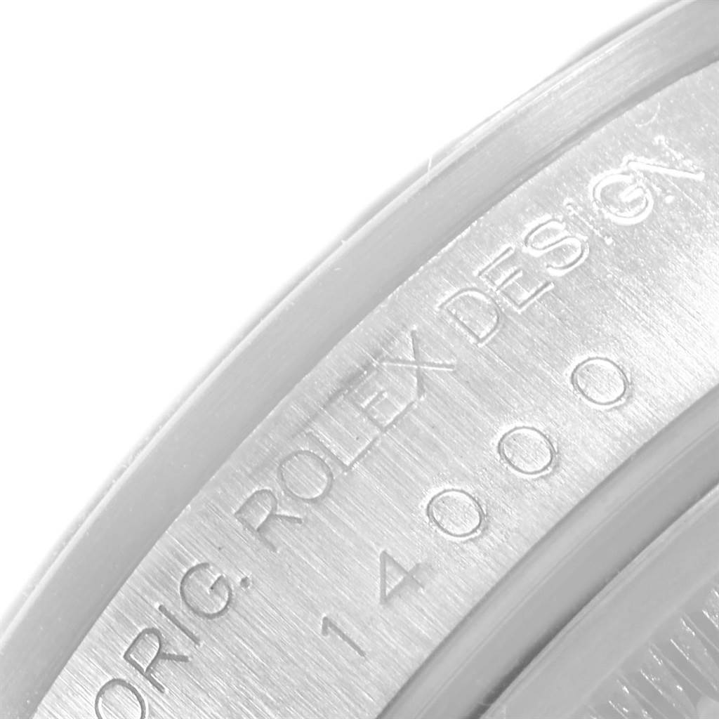 The image shows a close-up of the casing side, displaying the serial number and "ORIG. ROLEX DESIGN" engraving of a Rolex Air-King 14000 Men's Stainless Steel Blue Dial 14000 Men's Stainless Steel Blue Dial watch.
