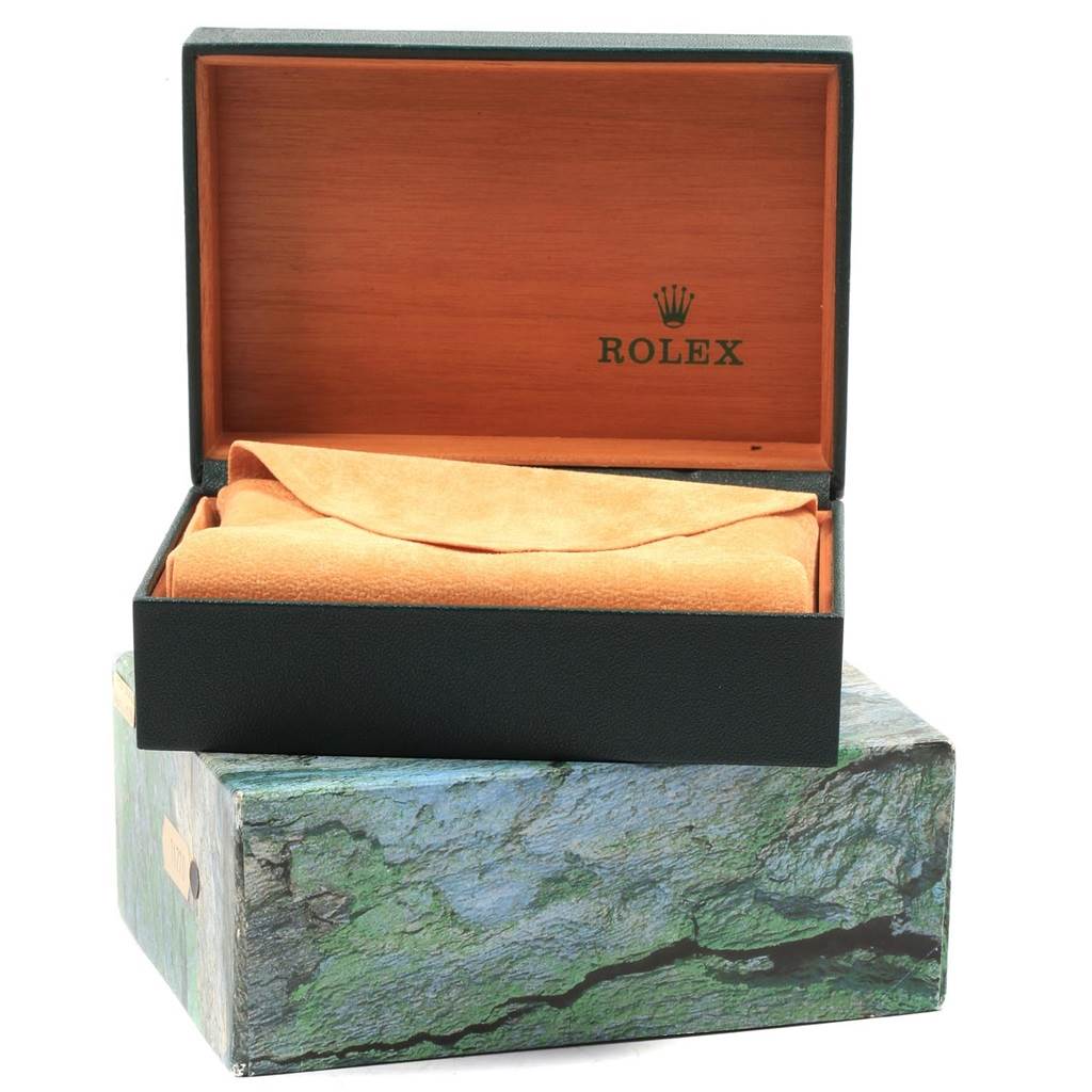 The image shows the open box and packaging of the Rolex Air-King 14000 Men's Stainless Steel Blue Dial 14000 Men's Stainless Steel Blue Dial watch, with a protective cloth inside.