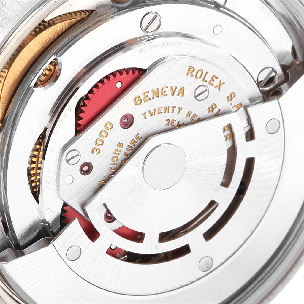 This image shows a close-up view of the internal mechanism of a Rolex Air-King 14000 Men's Stainless Steel Blue Dial 14000 Men's Stainless Steel Blue Dial watch, highlighting the rotor and movement components.