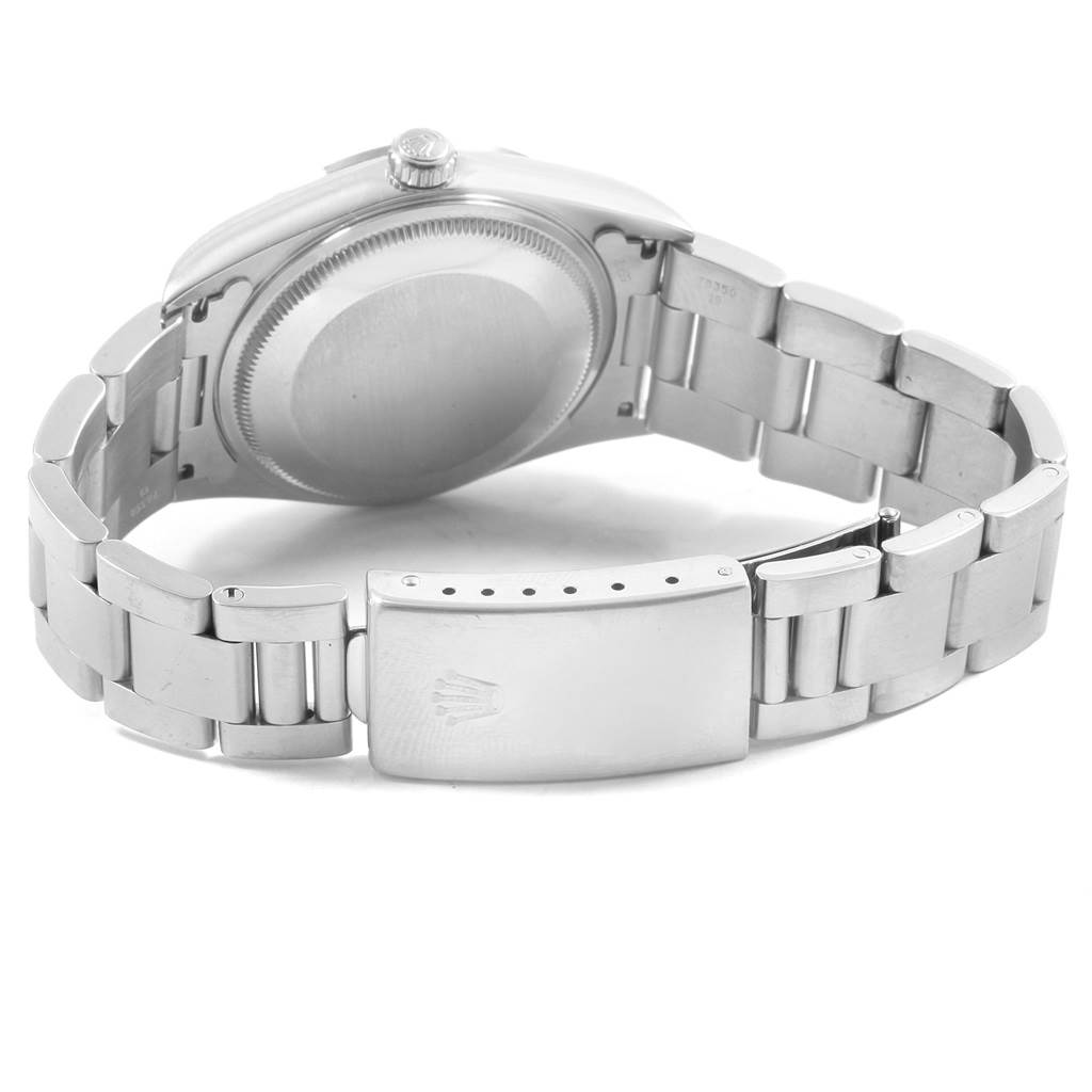 This image shows the back case and bracelet clasp of the Rolex Air-King 14000 Men's Stainless Steel Blue Dial 14000 Men's Stainless Steel Blue Dial watch at an angle.