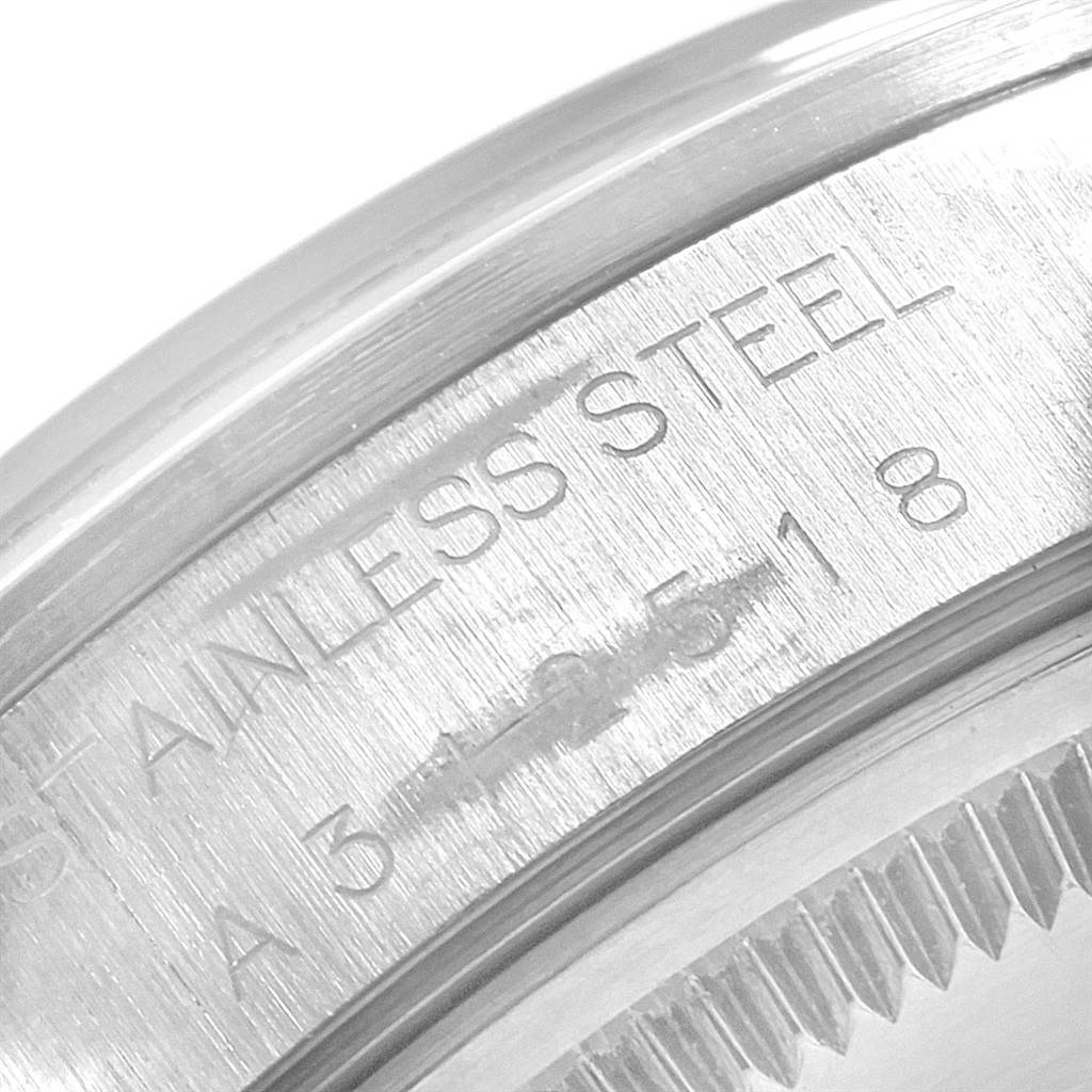 This close-up image of a Rolex Air-King 14000 Men's Stainless Steel Blue Dial 14000 Men's Stainless Steel Blue Dial watch shows the engraved stainless steel detail with partial serial numbers.