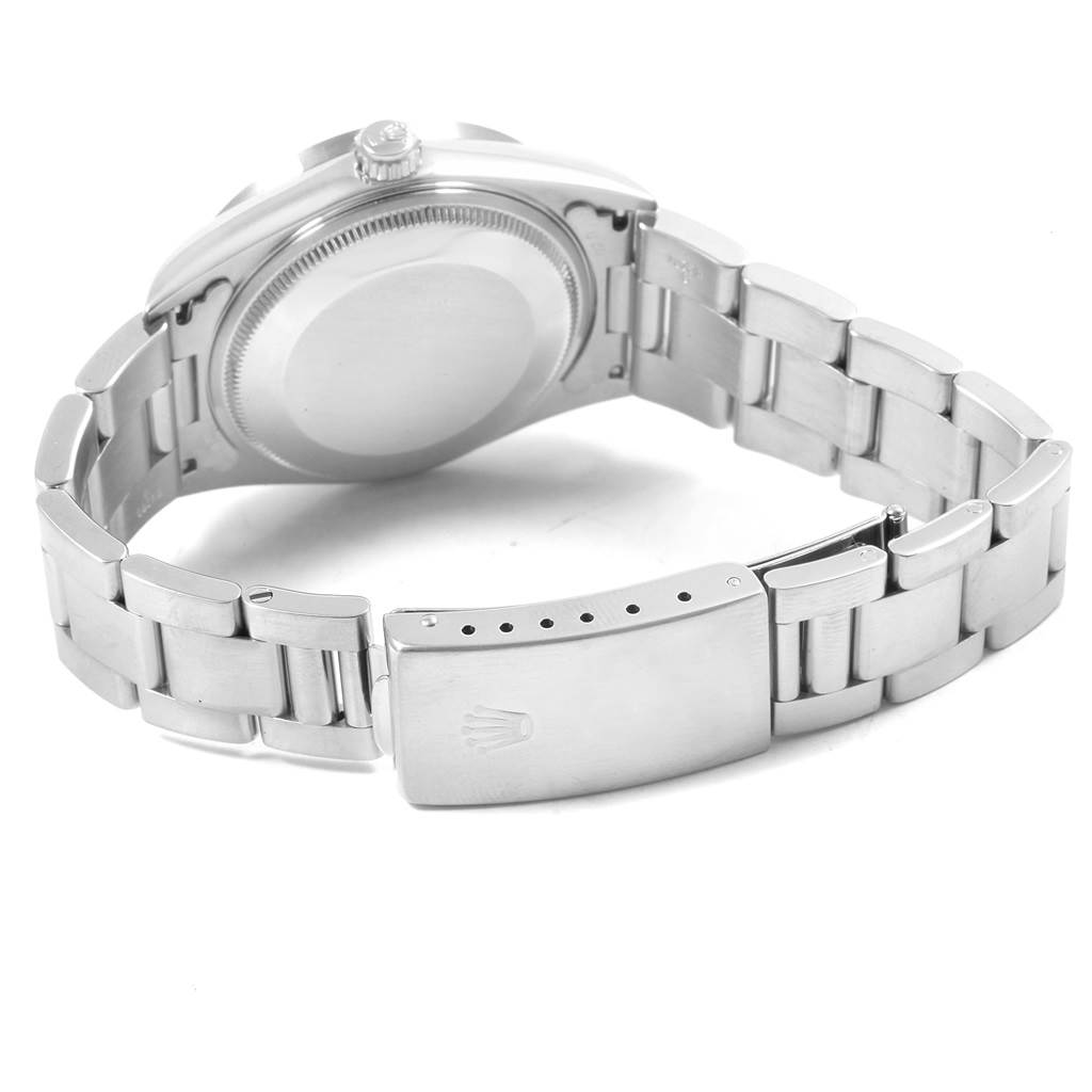 This image shows the rear view of a Rolex Air-King 14010 Men's Stainless Steel Blue Dial 14010 Men's Stainless Steel Blue Dial watch, displaying the closed case back and metal bracelet with clasp.