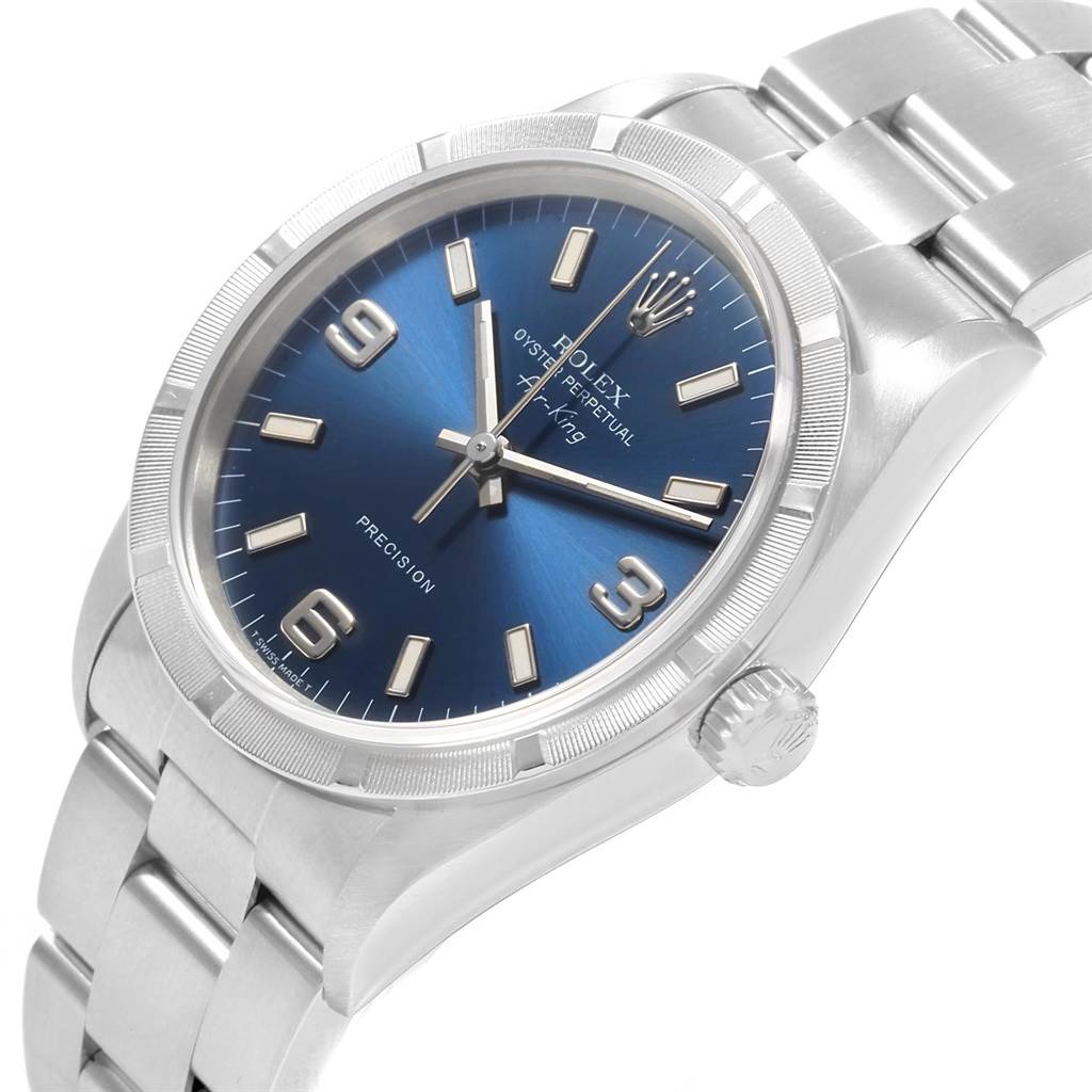The Rolex Air-King 14010 Men's Stainless Steel Blue Dial 14010 Men's Stainless Steel Blue Dial watch is shown at a slight angle, featuring the blue dial, crown, bezel, and part of the metal bracelet.