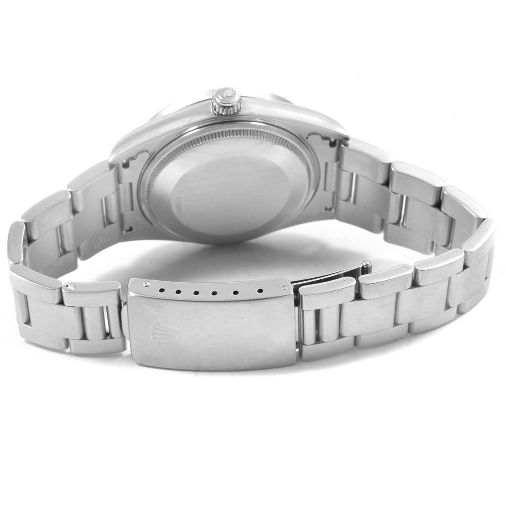 This image shows the back case and the bracelet clasp of the Rolex Air-King 14010 Men's Stainless Steel Black Dial 14010 Men's Stainless Steel Black Dial watch from a rear angle.