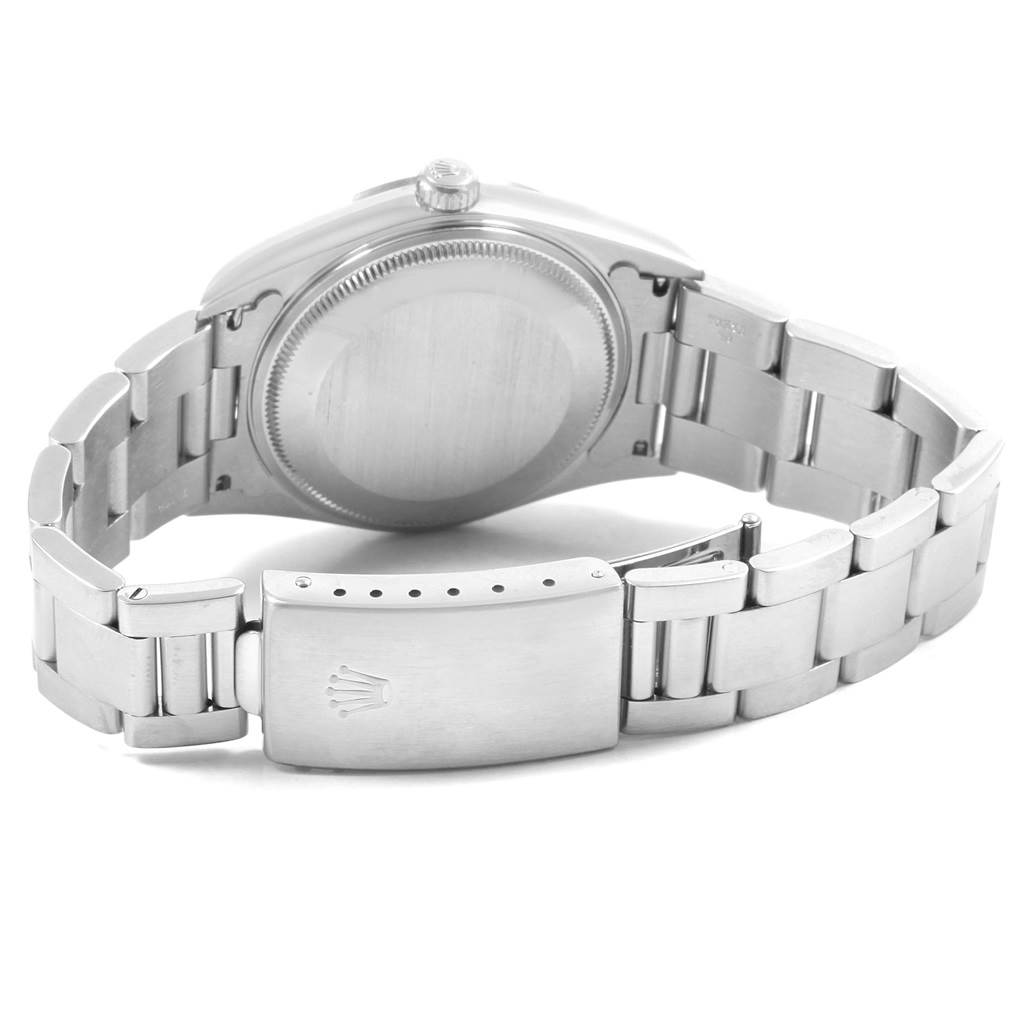 This image shows the back off the clasp and bracelet of a Rolex Air-King 19798 Men's Stainless Steel Black Dial 19798 Men's Stainless Steel Black Dial watch opened from a rear angle.