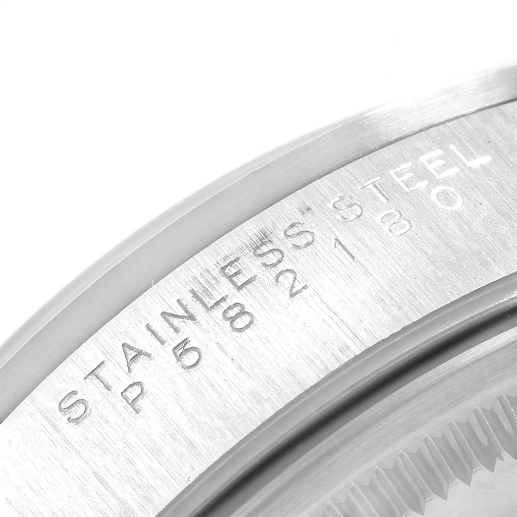 Close-up of the case back engraving of a Rolex Air-King 14000 Men's Stainless Steel White Dial 14000 Men's Stainless Steel White Dial, showing markings including "STAINLESS STEEL."