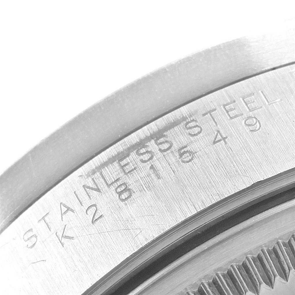 This is a close-up image of the stainless steel caseback with engravings on a Rolex Air-King 14010 Men's Stainless Steel Blue Dial 14010 Men's Stainless Steel Blue Dial watch.