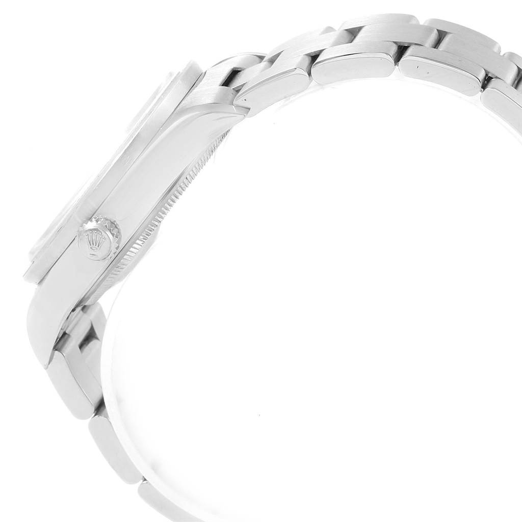 The image shows a Rolex Air-King 14010 Men's Stainless Steel Blue Dial 14010 Men's Stainless Steel Blue Dial watch from a side angle, highlighting its crown and metal bracelet.