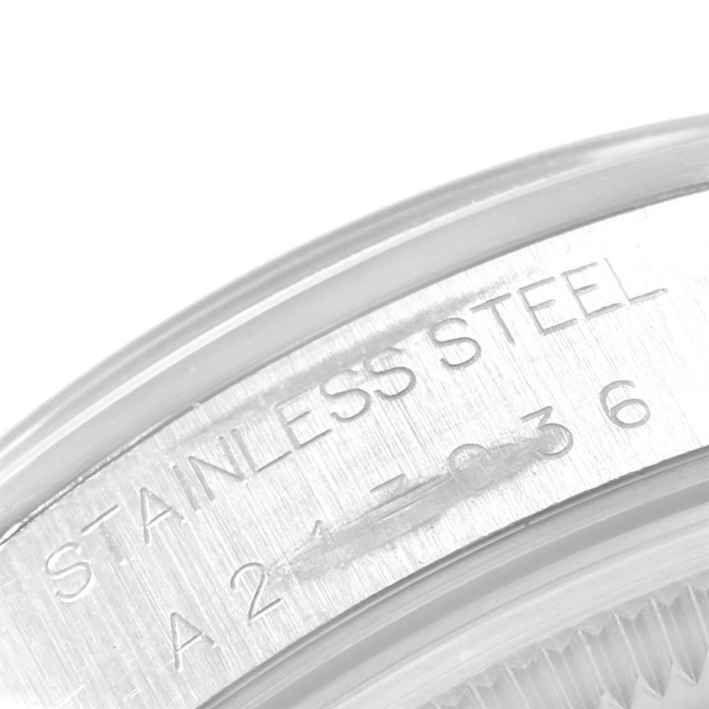 Close-up view of the case back of a Rolex Air-King 14000 Men's Stainless Steel Blue Dial 14000 Men's Stainless Steel Blue Dial watch, showing stainless steel text and part of the serial number.