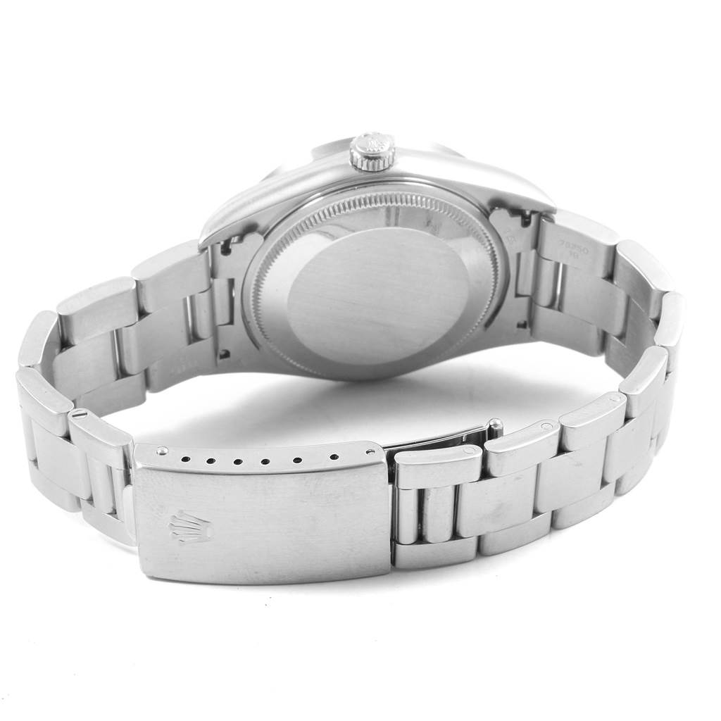 This image shows the Rolex Air-King 14010 Men's Stainless Steel Blue Dial 14010 Men's Stainless Steel Blue Dial watch from the back, highlighting the case back, crown, and metal bracelet clasp.