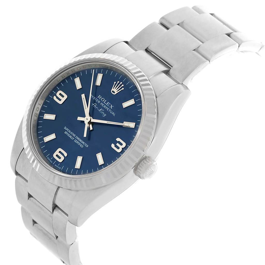 This image shows a Rolex Air-King 114234 Men's Stainless Steel Blue Dial 114234 Men's Stainless Steel Blue Dial watch angled from the top right, highlighting its blue dial, crown, and stainless steel bracelet.