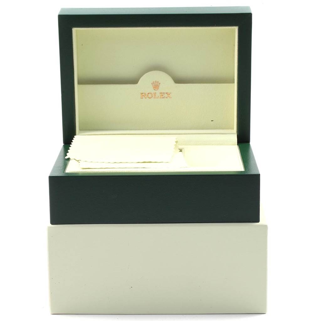 The image shows an open Rolex Air-King 114234 Men's Stainless Steel Blue Dial 114234 Men's Stainless Steel Blue Dial watch box, including an inner compartment and a cleaning cloth.