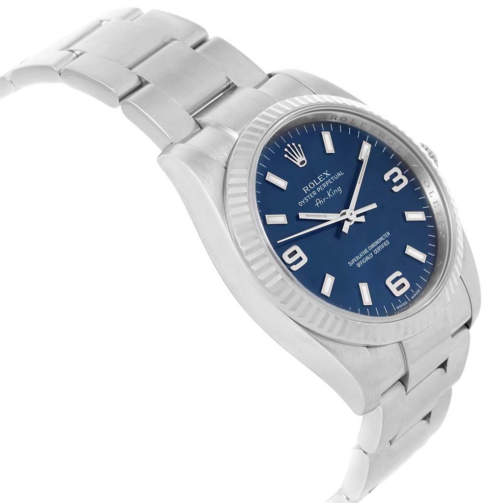 The Rolex Air-King 114234 Men's Stainless Steel Blue Dial 114234 Men's Stainless Steel Blue Dial watch is shown at an angle, highlighting its blue dial, stainless steel case, and bracelet.