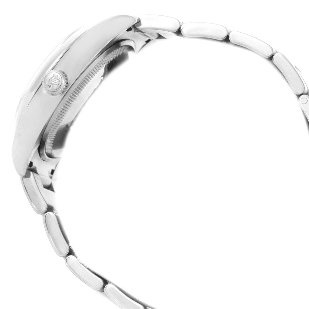 The image shows a side view of the case and the stainless steel bracelet of a Rolex Air-King 114200 Men's Stainless Steel Silver Dial 114200 Men's Stainless Steel Silver Dial watch.