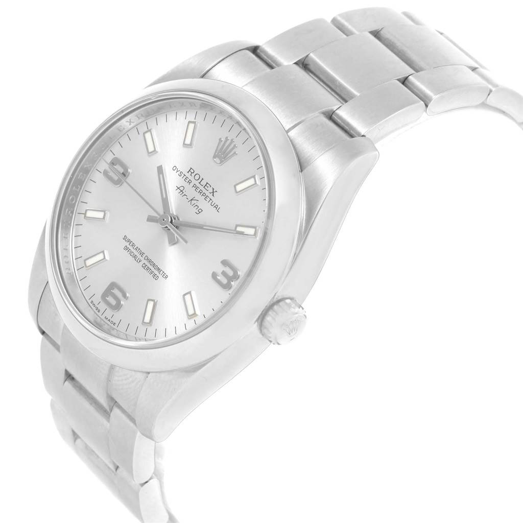 The Rolex Air-King 20465 Men's Stainless Steel Silver Dial 20465 Men's Stainless Steel Silver Dial watch is shown from an angle highlighting the face, crown, and part of the metal bracelet.