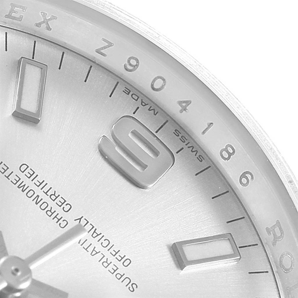 This close-up image shows a partial dial of the Rolex Air-King 20465 Men's Stainless Steel Silver Dial 20465 Men's Stainless Steel Silver Dial watch, highlighting the 9 o'clock marker and part of the surrounding text.