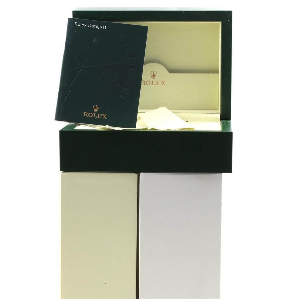 The image shows the open box of a Rolex Air-King 114200 Men's Stainless Steel Silver Dial 114200 Men's Stainless Steel Silver Dial watch with accompanying documentation placed partly inside.