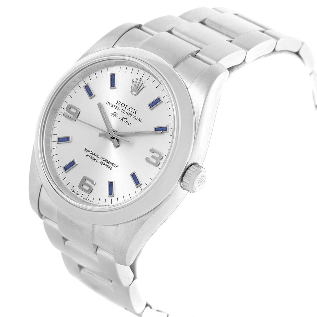 The Rolex Air-King 114200 Men's Stainless Steel Silver Dial 114200 Men's Stainless Steel Silver Dial watch is shown at a slight side angle displaying the watch face, crown, and bracelet.