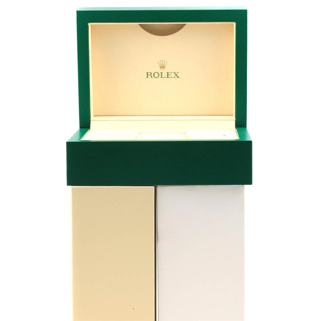 The image shows an open green Rolex box, likely for the Air-King model, viewed from the front.