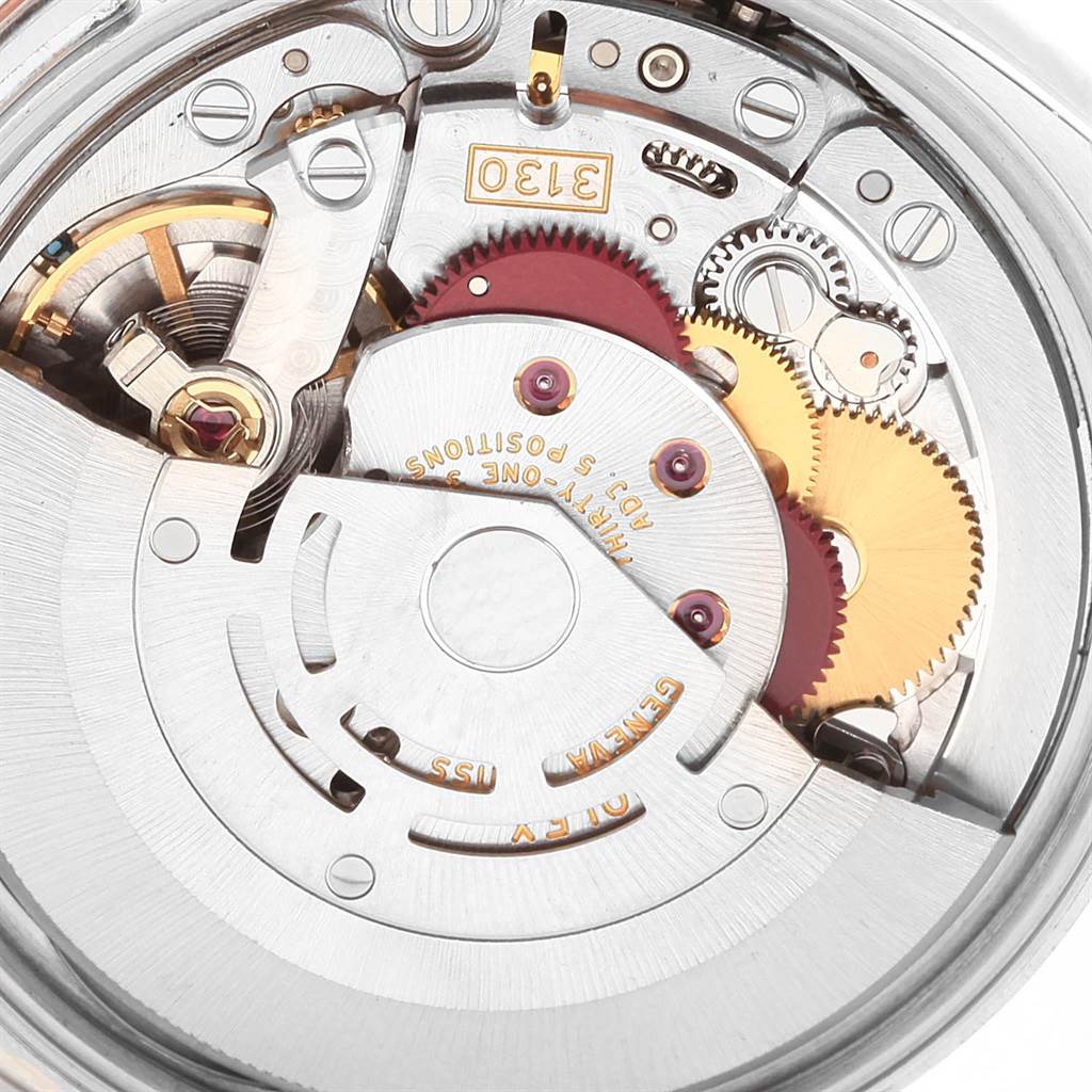 The image shows a close-up of the movement mechanism of a Rolex Air-King 114200 Stainless Steel White Dial 114200 Stainless Steel White Dial watch.