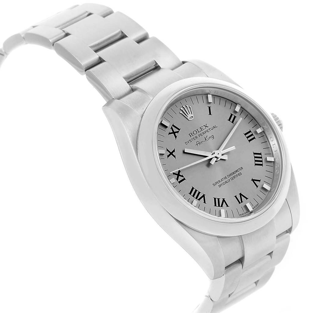 The image shows a Rolex Air-King 114200 Stainless Steel White Dial 114200 Stainless Steel White Dial watch from a slightly angled view, highlighting its face, bezel, and metal bracelet.