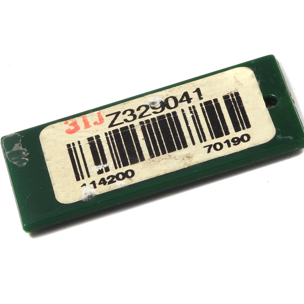 This is a close-up image of a green tag with a barcode and serial number from a Rolex Air-King 114200 Men's Stainless Steel White Dial 114200 Men's Stainless Steel White Dial watch.