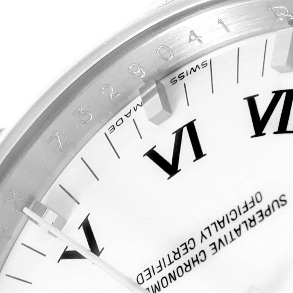 The image shows a close-up of the dial and bezel of a Rolex Air-King 114200 Men's Stainless Steel White Dial 114200 Men's Stainless Steel White Dial watch, highlighting the Roman numeral VI and surrounding text.