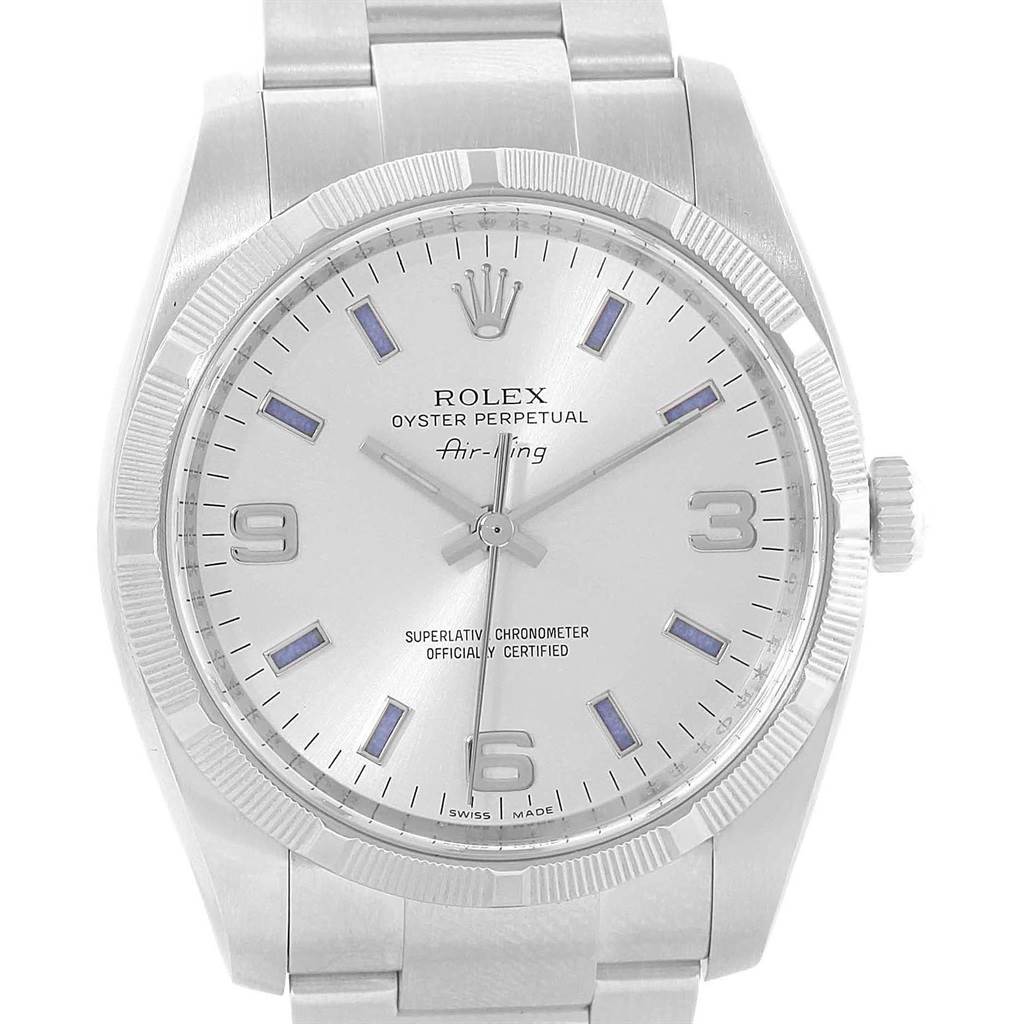 The image shows a front view of the Rolex Air-King 114210 Men's Stainless Steel Silver Dial 114210 Men's Stainless Steel Silver Dial watch, highlighting the dial, hands, crown, and part of the bracelet.