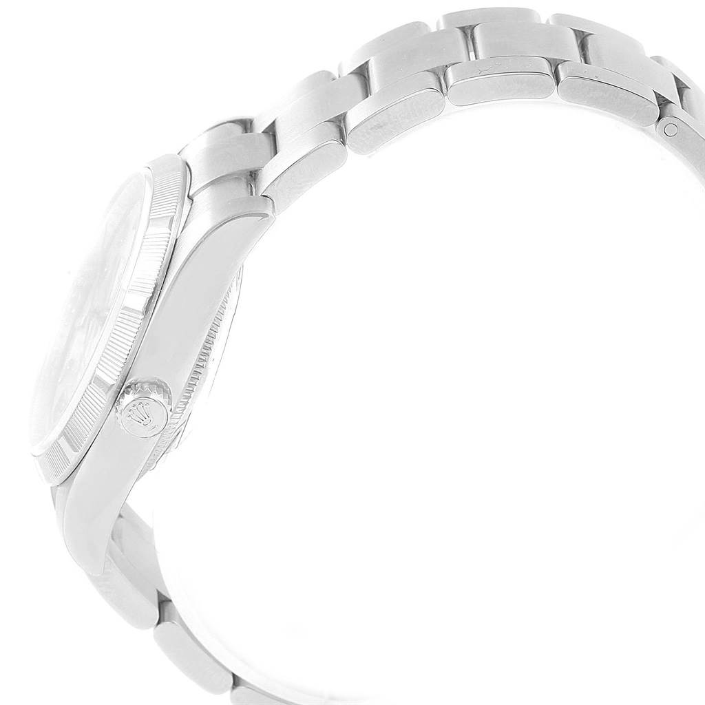 The image shows a side view of the Rolex Air-King 114210 Men's Stainless Steel Silver Dial 114210 Men's Stainless Steel Silver Dial watch, highlighting the crown, case, and metal bracelet.