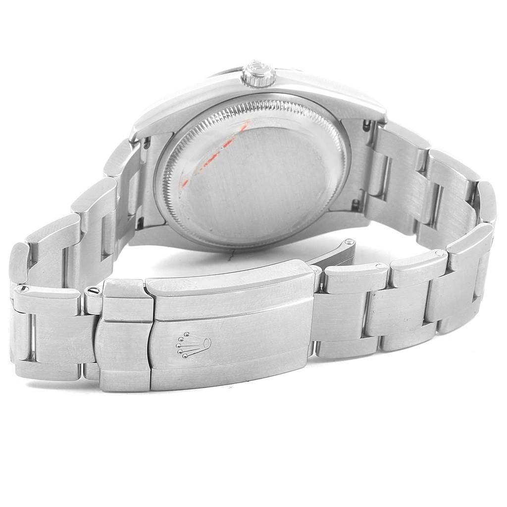 This image shows the back case and clasp of a Rolex Air-King 114210 Men's Stainless Steel Silver Dial 114210 Men's Stainless Steel Silver Dial watch from a rear angle.