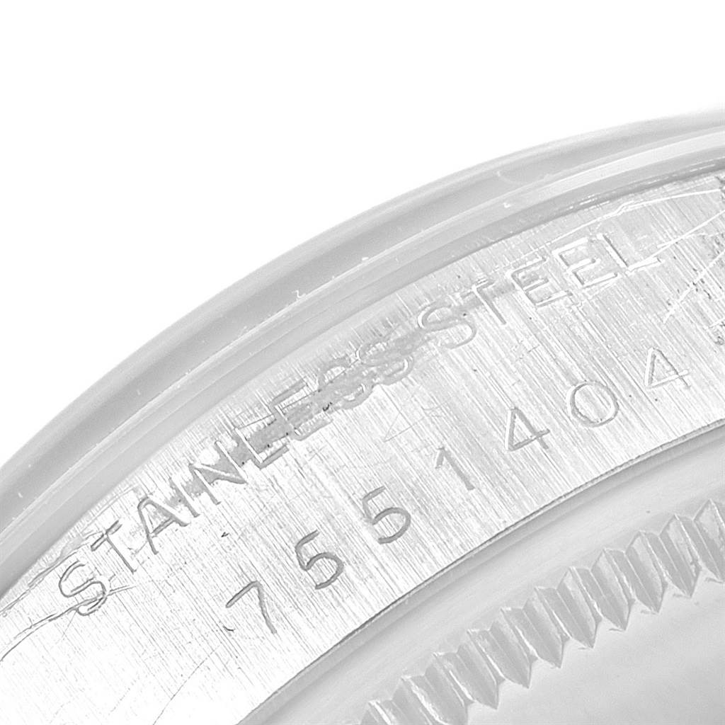 The image shows a close-up view of the back case of the Rolex Air-King 5500 Men's Stainless Steel Silver Dial 5500 Men's Stainless Steel Silver Dial watch, displaying its stainless steel engraving.