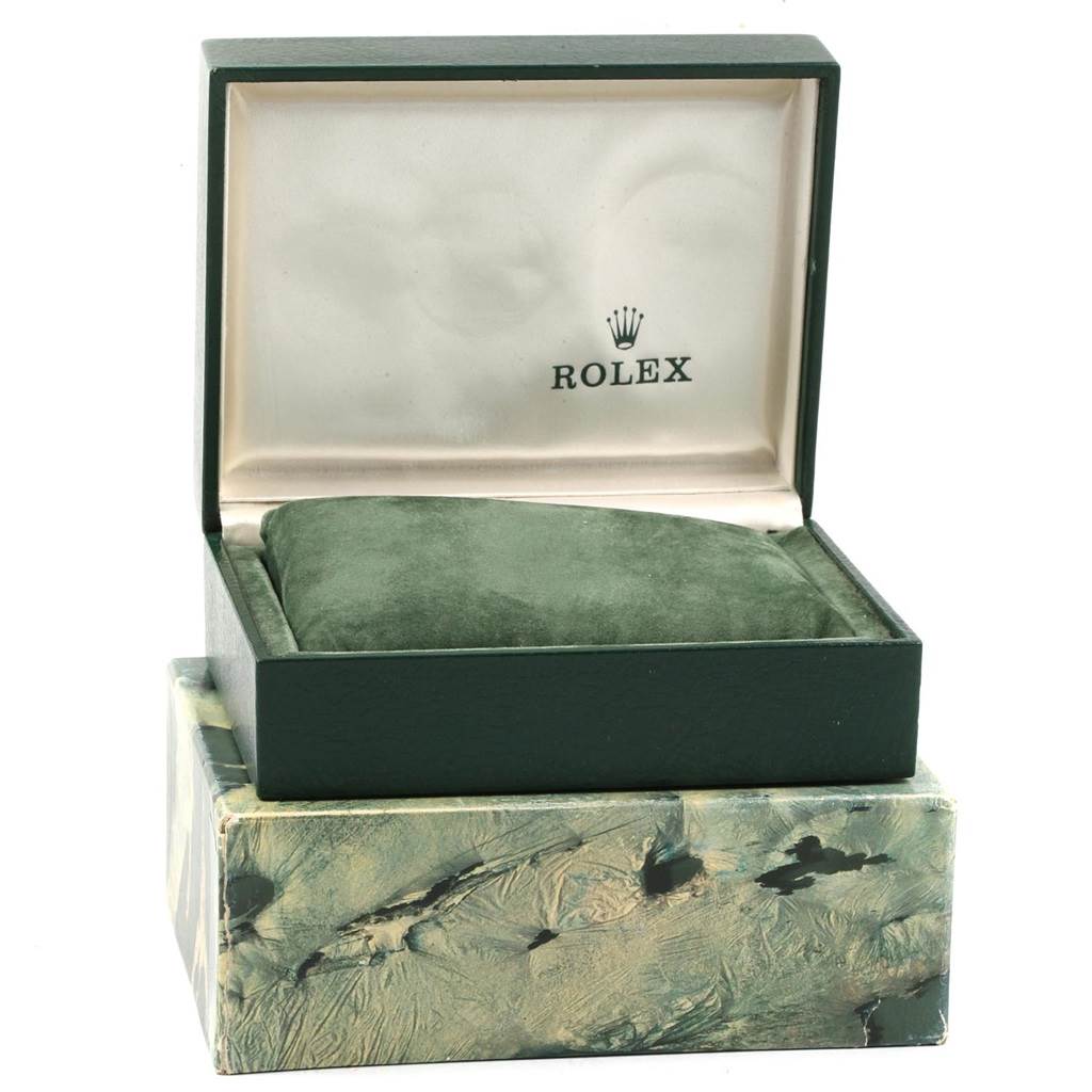 The image shows an open box of a Rolex Air-King 5500 Men's Stainless Steel Silver Dial 5500 Men's Stainless Steel Silver Dial watch, displaying the inner cushion and brand logo.