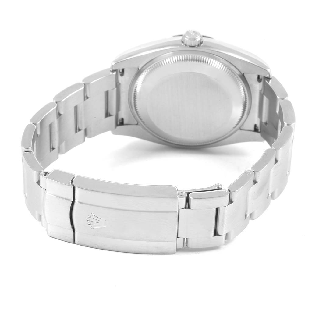 This image shows the back view of a Rolex Air-King 114200 Men's Stainless Steel Silver Dial 114200 Men's Stainless Steel Silver Dial watch, highlighting its closed case back and bracelet with the clasp.