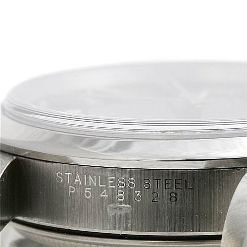 The image shows a close-up side view of the stainless steel casing of a Rolex Air-King 14000 Men's Stainless Steel Black Dial 14000 Men's Stainless Steel Black Dial watch, highlighting its serial number.