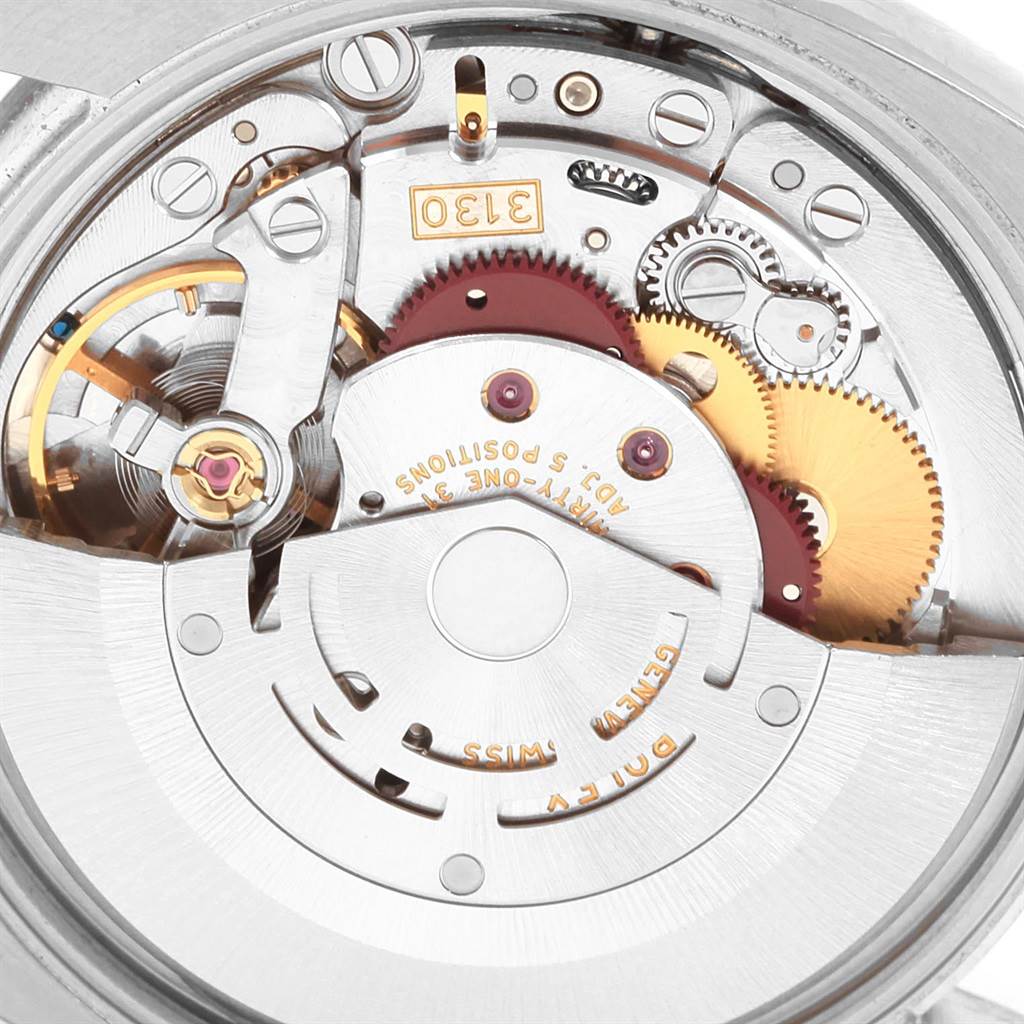 This image shows a close-up of the Rolex Air-King 114200 Men's Stainless Steel Blue Dial 114200 Men's Stainless Steel Blue Dial's intricate watch movement and internal mechanics.