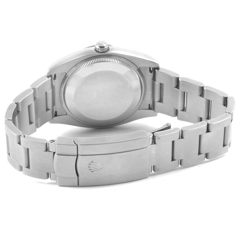 The image shows the back view and the clasp of a Rolex Air-King 114200 Men's Stainless Steel Blue Dial 114200 Men's Stainless Steel Blue Dial watch, highlighting the bracelet and case back.