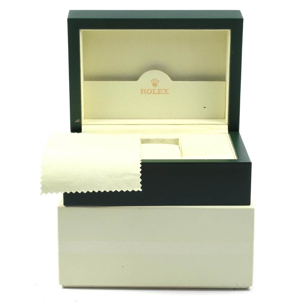 The image shows an open Rolex box, likely for the Air-King model, with a cloth placed on the edge of the box.