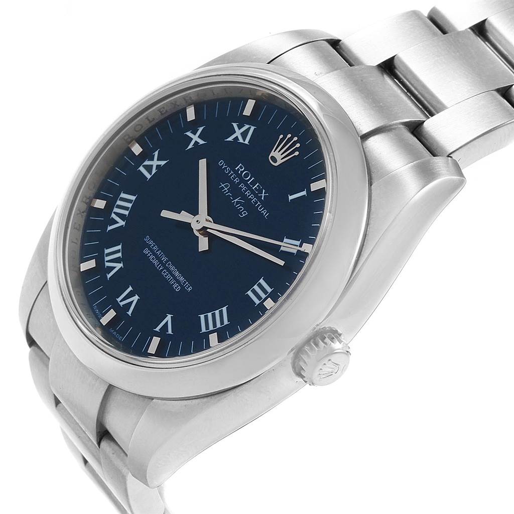 This image shows a Rolex Air-King 114200 Men's Stainless Steel Blue Dial 114200 Men's Stainless Steel Blue Dial watch at an angled view, showcasing its blue dial, Roman numerals, case, bezel, bracelet, and crown.
