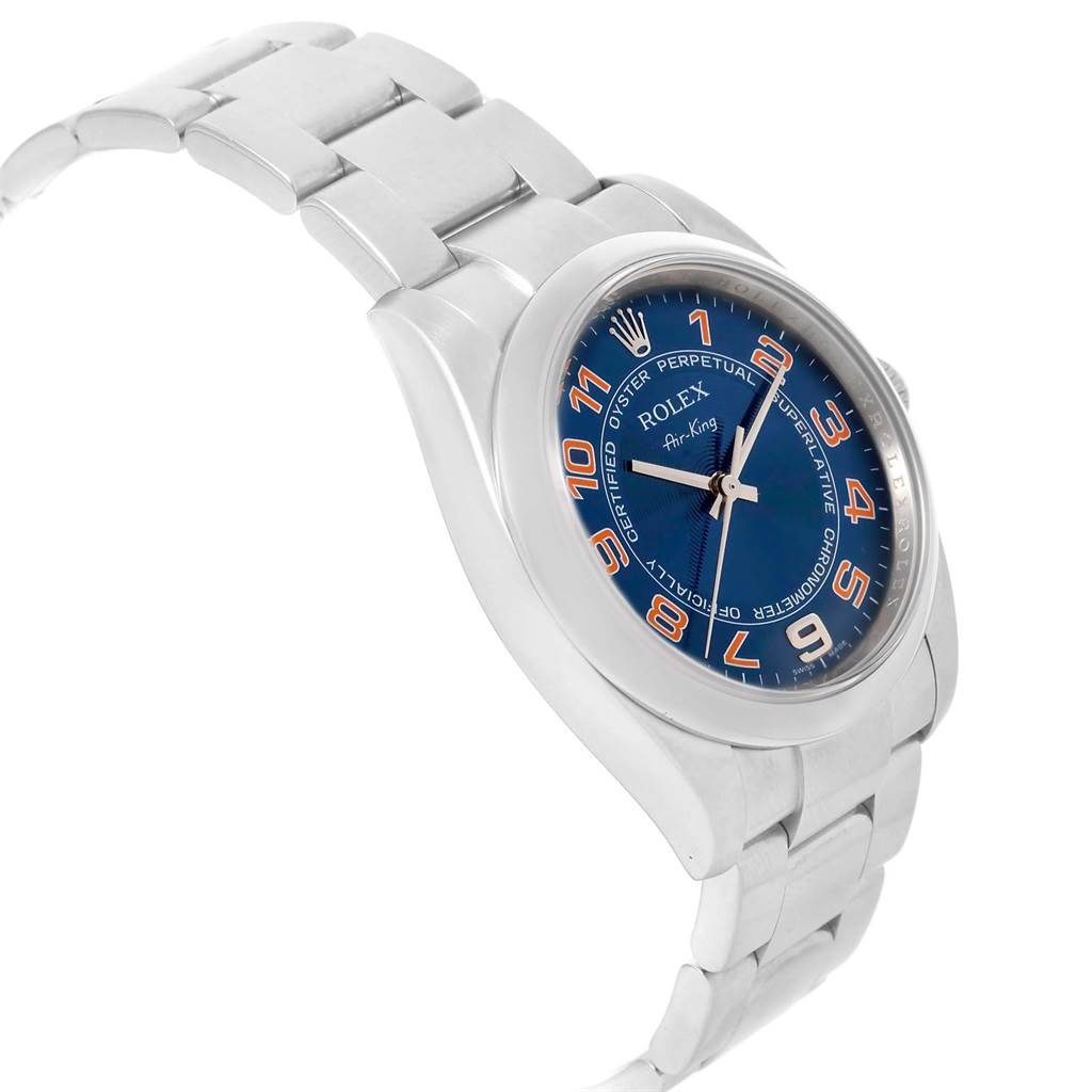 The image shows a side angle of a Rolex Air-King 114200 Men's Stainless Steel Blue Dial 114200 Men's Stainless Steel Blue Dial watch, highlighting the blue dial, silver case, and metal bracelet.