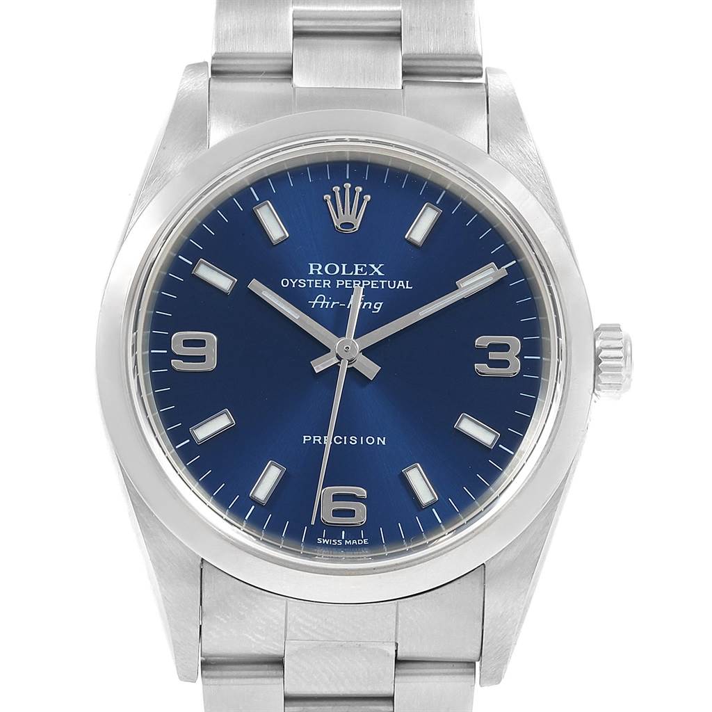 The image shows a front view of a Rolex Air-King 14000 Men's Stainless Steel Blue Dial 14000 Men's Stainless Steel Blue Dial watch revealing its blue dial, hour markers, hands, and part of its metal band.