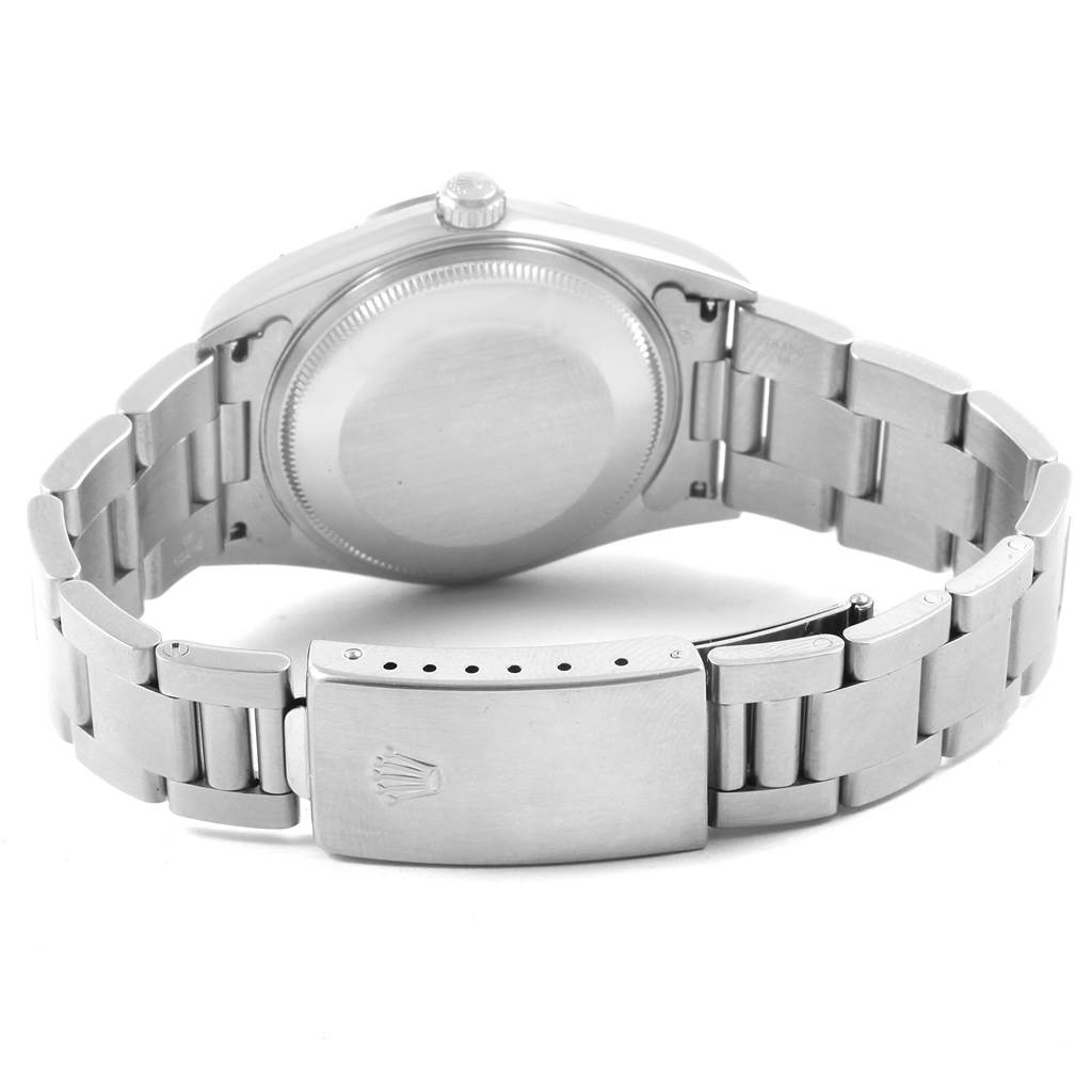 The image shows the backside of a Rolex Air-King 14000 Men's Stainless Steel Blue Dial 14000 Men's Stainless Steel Blue Dial watch, highlighting its clasp, bracelet, and case back.