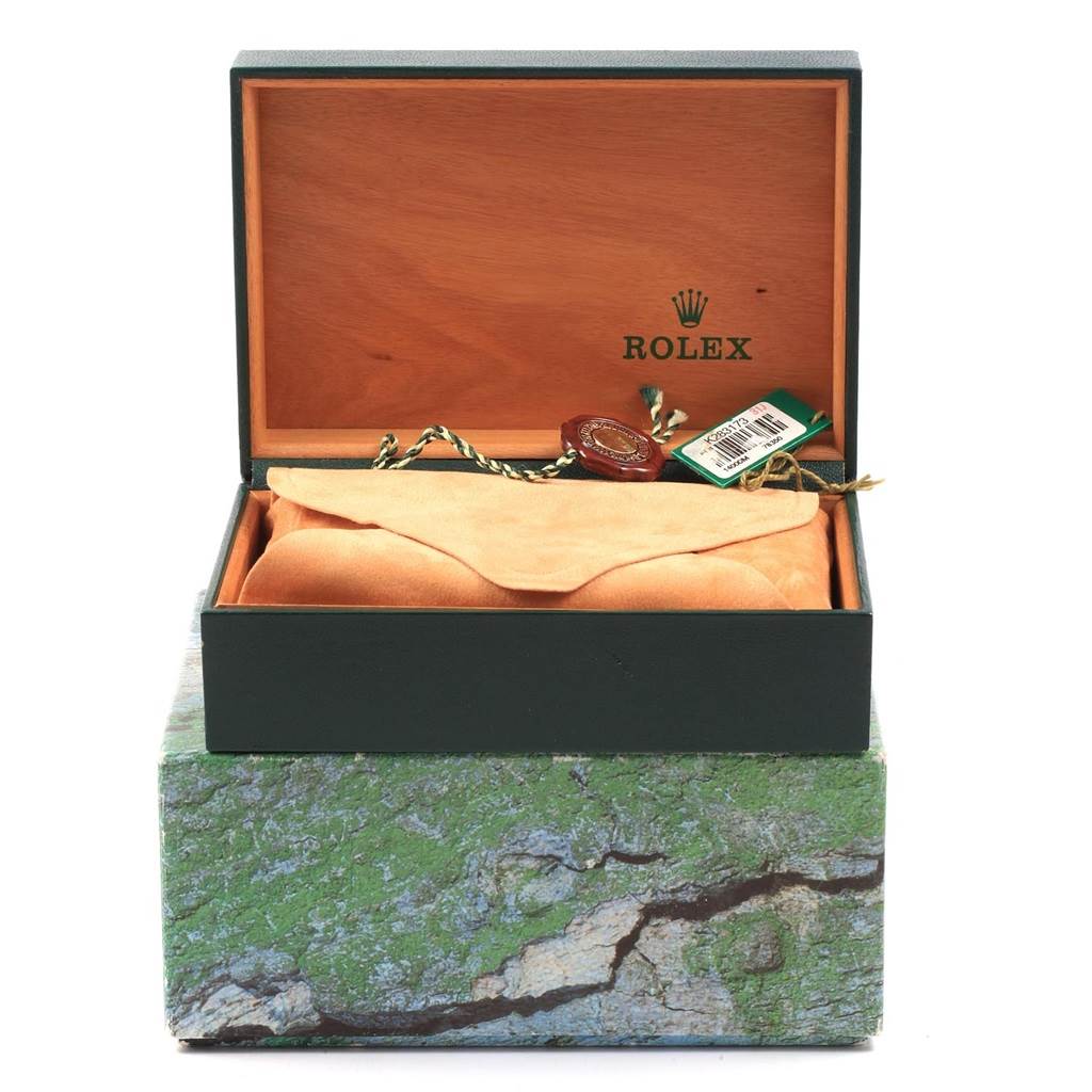 The image shows an open Rolex Air-King 14000 Men's Stainless Steel Blue Dial 14000 Men's Stainless Steel Blue Dial box containing a watch pouch, a tag, and a seal.