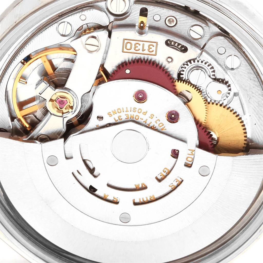 Close-up of the Rolex Air-King 14000 Men's Stainless Steel Silver Dial 14000 Men's Stainless Steel Silver Dial watch movement, showing gears and intricate internal mechanisms.