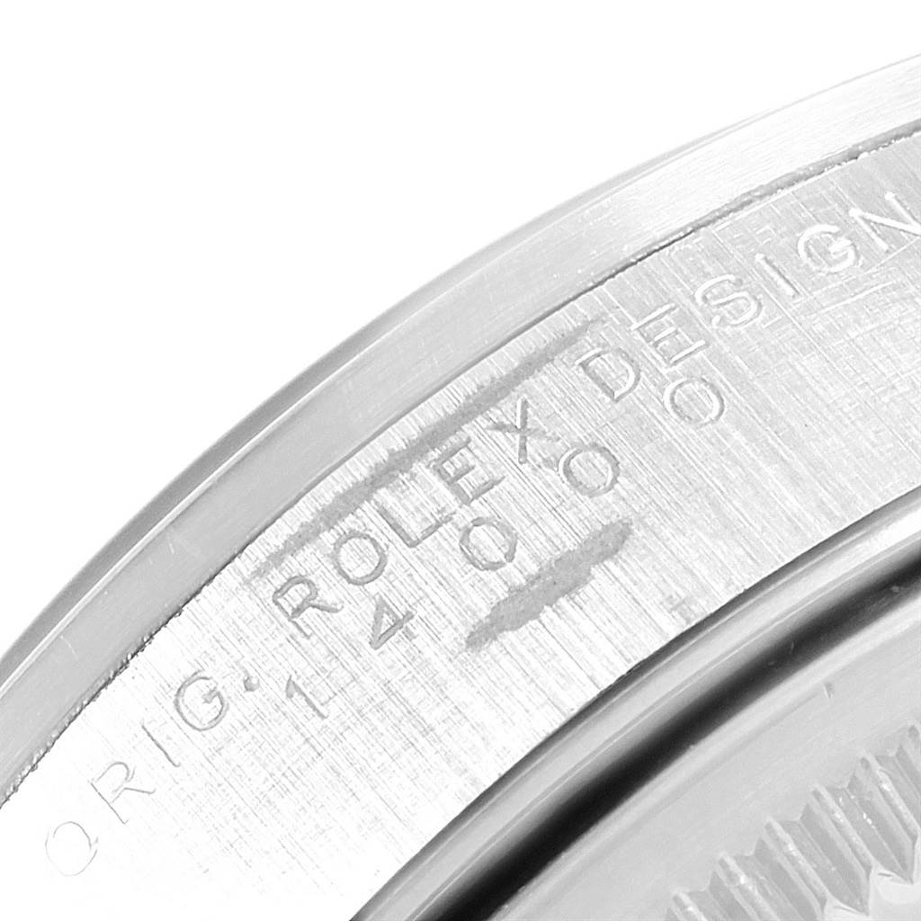 The image shows a close-up of the engraved side of the bezel on a Rolex Air-King 14000 Men's Stainless Steel Blue Dial 14000 Men's Stainless Steel Blue Dial watch.