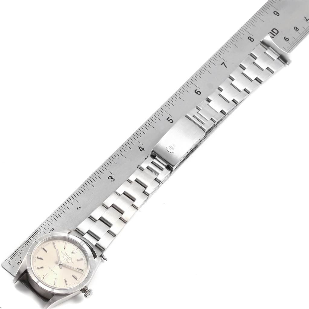 The image shows a Rolex Air-King 14010 Men's Stainless Steel Silver Dial 14010 Men's Stainless Steel Silver Dial watch placed horizontally with a ruler alongside for size reference.