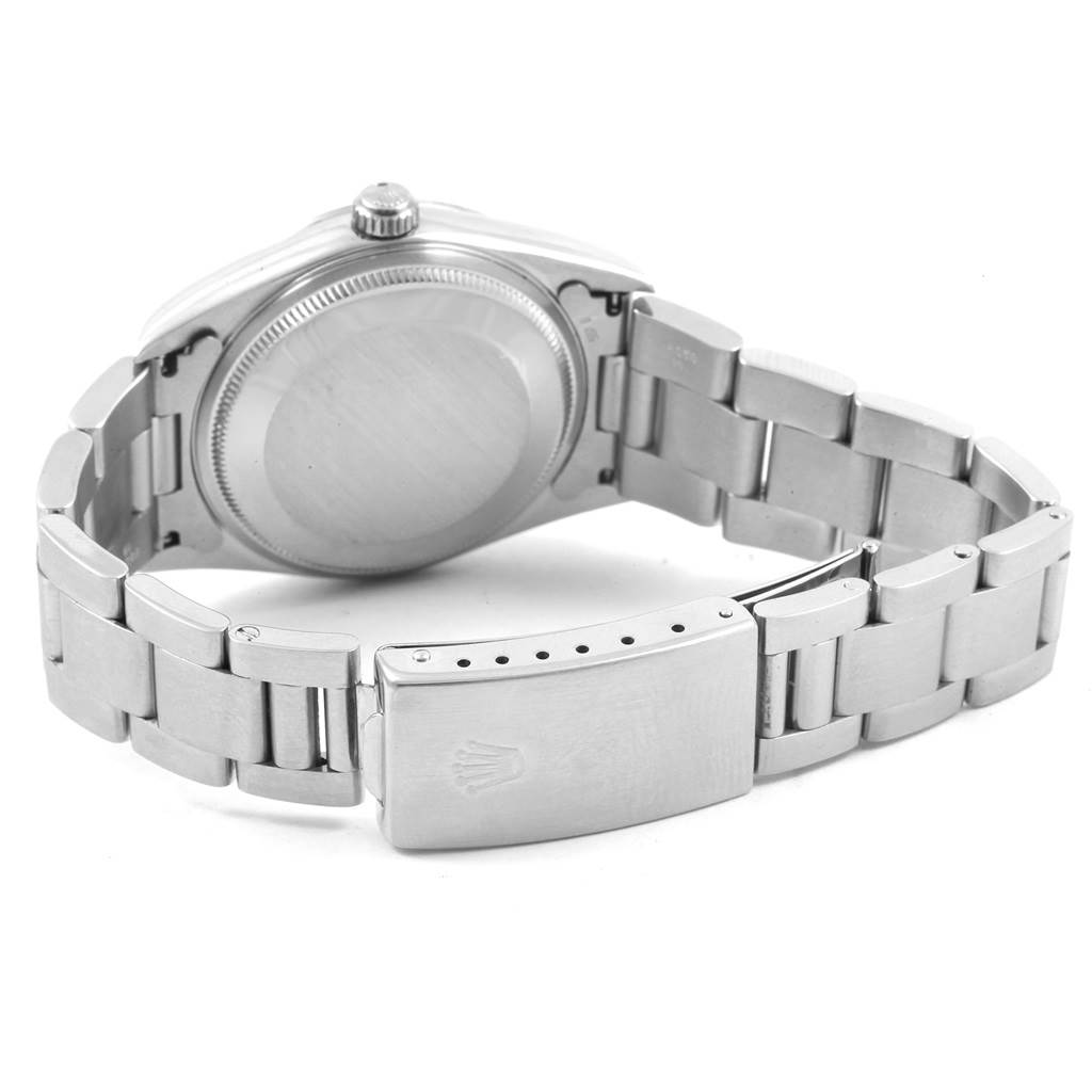 This image shows the back of a Rolex Air-King 14000 Men's Stainless Steel Pink Dial 14000 Men's Stainless Steel Pink Dial watch, highlighting the case back, crown, and metal bracelet and clasp.