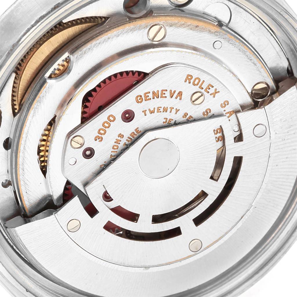 This image shows the internal movement mechanism of a Rolex Air-King 14000 Men's Stainless Steel Pink Dial 14000 Men's Stainless Steel Pink Dial watch, highlighting gears and the rotor.