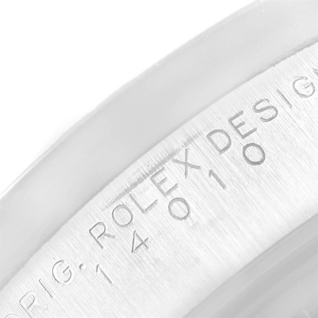 This is a close-up of the case back engraving of a Rolex Air-King 14010 Men's Stainless Steel Silver Dial 14010 Men's Stainless Steel Silver Dial watch, showing partial serial numbers and the "Rolex" inscription.