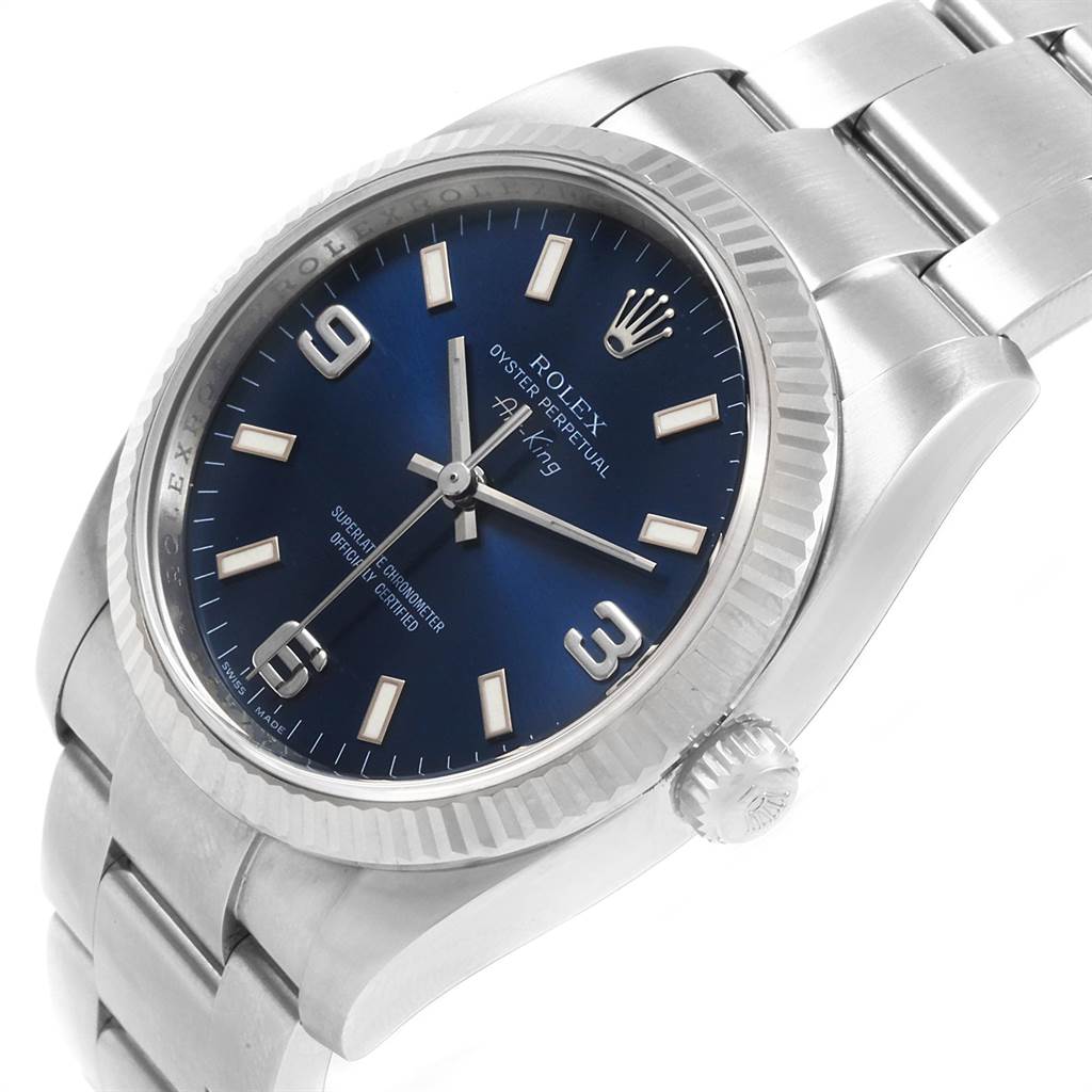 The image shows a Rolex Air-King 114234 Men's Stainless Steel Blue Dial 114234 Men's Stainless Steel Blue Dial watch from a left-side angle, highlighting the dial, bezel, crown, and bracelet.