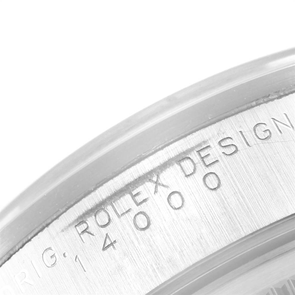 This close-up image shows the engraved model number and branding on the side of a Rolex Air-King 14000 Men's Stainless Steel Silver Dial 14000 Men's Stainless Steel Silver Dial watch case.